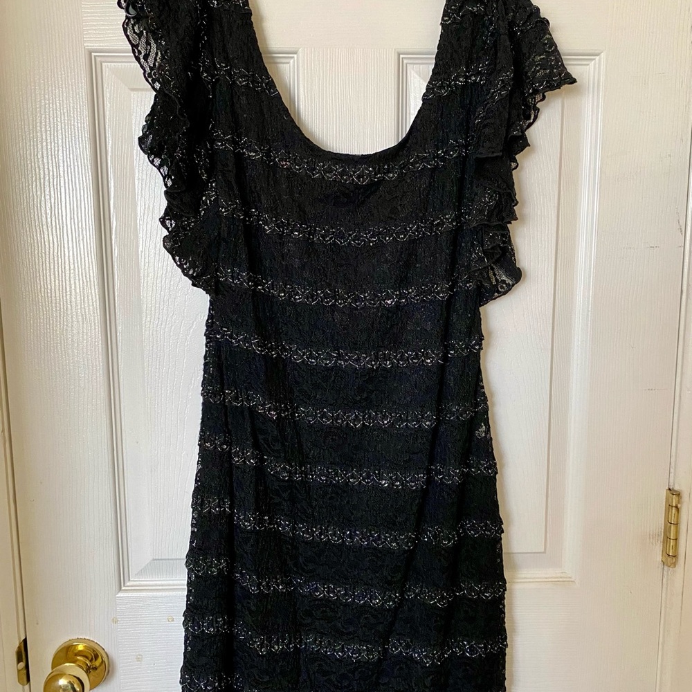 Worn only once! This beautiful dress is very flattering